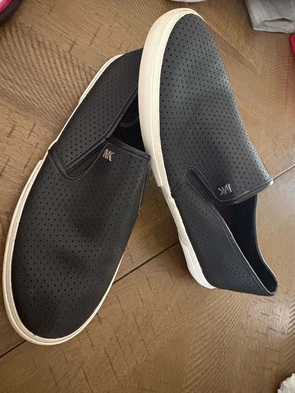 Michael Kors Women's Perforated Black Leather Slip-On Sneakers